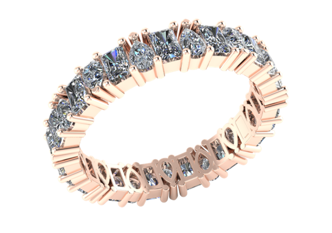 Anillo de Diamantes con corte Pera y Esmeralda